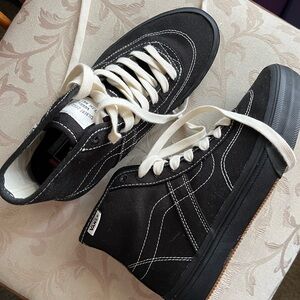 Vans Black and White High-Top Sneakers